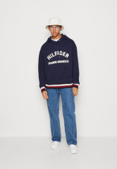 Tommy Hilfiger TOMMY HILFIGER X SHAWN MENDES HOODIE UNISEX Hoodie carbon navy TOMMY HILFIGER X SHAWN MENDES HOODIE UNISEX Худи углеродный флот