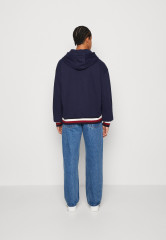 Tommy Hilfiger TOMMY HILFIGER X SHAWN MENDES HOODIE UNISEX Hoodie carbon navy TOMMY HILFIGER X SHAWN MENDES HOODIE UNISEX Худи углеродный флот