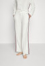 Tommy Hilfiger LONG PANTS TAPE EXT SIZES Tracksuit bottoms ecru LONG PANTS TAPE EXT SIZES Спортивные штаны экрю