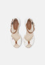 Tommy Hilfiger ICONIC ELBA  Platform sandals ecru ICONIC ELBA Сандалии на платформе экрю