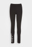 Tommy Hilfiger SLIM ROPE  Leggings Trousers black SLIM ROPE Леггинсы Брюки черный