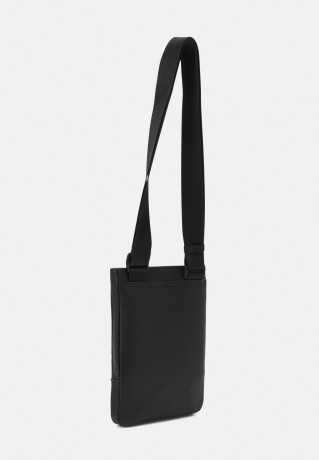 Tommy Hilfiger ESSENTIAL CROSSOVER UNISEX Across body bag black ESSENTIAL CROSSOVER UNISEX Сумка через плечо черный