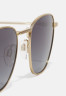 Tommy Hilfiger Sunglasses gold-coloured Солнечные очки золотого цвета