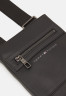 Tommy Hilfiger CORPORATE MINI CROSSOVER UNISEX Across body bag black CORPORATE MINI CROSSOVER UNISEX Сумка через плечо черный