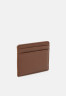 Tommy Hilfiger CASUAL CHIC HOLDER Wallet cognac CASUAL CHIC HOLDER Бумажник коньяк