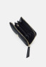 Tommy Hilfiger FLOW SOLID Wallet space blue FLOW SOLID Бумажник космический синий