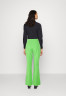 Tommy Hilfiger VIS FLARED HW TAILORED  Trousers spring lime VIS FLARED HW TAILORED Брюки весенняя известь