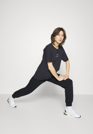 Tommy Hilfiger RELAXED GRAPHIC PANT Tracksuit bottoms desert sky RELAXED GRAPHIC PANT Спортивные штаны небо пустыни