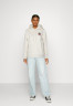 Tommy Hilfiger MONOGRAM HOODIE Hoodie heathered oatmilk ХУДИ С МОНОГРАММОЙ Толстовка с капюшоном овсяное молоко