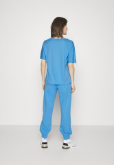 Tommy Hilfiger RELAXED GRAPHIC PANT Tracksuit bottoms hydrangea blue RELAXED GRAPHIC PANT Спортивные штаны гортензия синяя