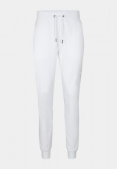 Tommy Hilfiger ROUNDALL GRAPHIC SWEATPANT UNISEX Tracksuit bottoms white СПОРТИВНЫЕ БРЮКИ ROUNDALL GRAPHIC UNISEX Спортивные штаны белый