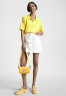 Tommy Hilfiger REG SS Polo shirt vivid yellow REG SS Рубашка поло ярко-желтый