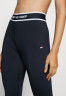 Tommy Hilfiger TAPE LEGGING Leggings desert sky ЛЕГГИНГИ С ЛЕНТОЙ Леггинсы небо пустыни