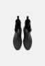 Tommy Hilfiger RAIN BOOT ANKLE ELASTIC Wellies black ДОЖДЕВЫЕ БОТИНКИ С ЭЛАСТИЧНОЙ ЛОДОЧКОЙ Резиновые сапоги черный