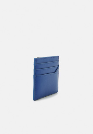 Tommy Hilfiger MODERN LEA HOLDER UNISEX Wallet ultra blue MODERN LEA HOLDER UNISEX Бумажник ультра синий