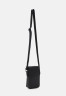 Tommy Hilfiger BUSINESS CROSSOVER UNISEX Across body bag black BUSINESS CROSSOVER UNISEX Сумка через плечо черный