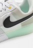 Nike Sportswear AIR FORCE 1 REACT UNISEX Sneaker low photon dust/white/mint foam/olive aura/vivid green/particle grey AIR FORCE 1 REACT UNISEX Низкие кроссовки женские фотонная пыль/белый/мятная пена/оливковая аура/ярко-зеленый/серая частица