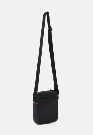 Tommy Hilfiger ELEVATED MINI UNISEX REPORTER Across body bag black ELEVATED MINI UNISEX REPORTER Сумка через плечо черный