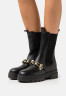 Tommy Hilfiger MONOCHROMATIC CHELSEA BOOT CHAIN Platform boots black MONOCHROMATIC CHELSEA BOOT CHAIN - Ботинки на платформе черный