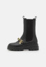 Tommy Hilfiger MONOCHROMATIC CHELSEA BOOT CHAIN Platform boots black MONOCHROMATIC CHELSEA BOOT CHAIN - Ботинки на платформе черный