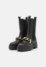 Tommy Hilfiger MONOCHROMATIC CHELSEA BOOT CHAIN Platform boots black MONOCHROMATIC CHELSEA BOOT CHAIN - Ботинки на платформе черный