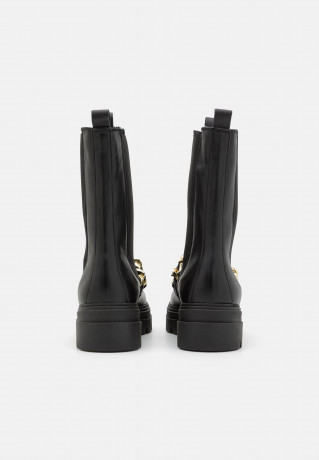Tommy Hilfiger MONOCHROMATIC CHELSEA BOOT CHAIN Platform boots black MONOCHROMATIC CHELSEA BOOT CHAIN - Ботинки на платформе черный