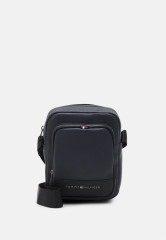 Tommy Hilfiger ESSENTIAL MINI REPORTER UNISEX Across body bag space blue ESSENTIAL MINI REPORTER UNISEX Сумка через плечо космический синий