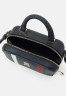 Tommy Hilfiger EMBLEM TRUNK CORP Across body bag space blue EMBLEM TRUNK CORP — Сумка через плечо космический синий