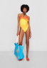 Tommy Hilfiger TOMMY HILFIGER X ANDY WARHOL ONE PIECE Swimsuit warhol sunset КОМБИНЕЗОН TOMMY HILFIGER X ANDY WARHOL Купальник Уорхол закат