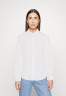 Tommy Hilfiger FIL A FIL REGULAR Button-down blouse optic white FIL A FIL REGULAR Блузка на пуговицах оптический белый