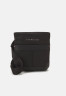 Tommy Hilfiger ELEVATED MINI CROSSOVER UNISEX Across body bag black ELEVATED MINI CROSSOVER UNISEX Сумка через плечо черный