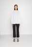 Tommy Hilfiger PIECED FLEUR Button-down blouse optic white PIECED FLEUR Блузка на пуговицах оптический белый