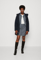 Tommy Hilfiger SHORT SKIRT MONOGRAM Mini skirt blue denim КОРОТКАЯ ЮБКА С МОНОГРАММОЙ Мини-юбка синий деним