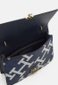 Tommy Hilfiger PUSHLOCK CROSSOVER MON Across body bag space blue PUSHLOCK CROSSOVER MON Сумка через плечо космический синий