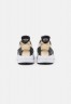 Nike Sportswear AIR HUARACHE Sneaker low white/black/sanddrift AIR HUARACHE Низкие кроссовки женские белый/черный/песок