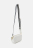 Tommy Hilfiger ICONIC CAMERA BAG MONO Across body bag weathered white ICONIC CAMERA BAG MONO Сумка через плечо выветрившийся белый
