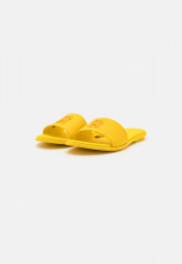 Tommy Hilfiger POP MULE Mules vivid yellow POP MULE Мюли ярко-желтый