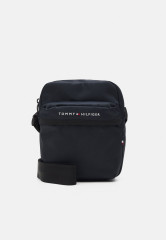 Tommy Hilfiger SKYLINE MINI REPORTER UNISEX Across body bag space blue SKYLINE MINI REPORTER UNISEX Сумка через плечо космический синий
