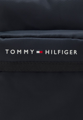 Tommy Hilfiger SKYLINE MINI REPORTER UNISEX Across body bag space blue SKYLINE MINI REPORTER UNISEX Сумка через плечо космический синий