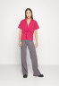 Tommy Hilfiger SOLID POPLIN TWIST Blouse bright cerise pink SOLID POPLIN TWIST Блузка ярко-вишнево-розовый