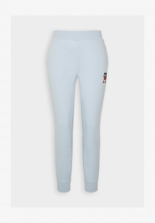 Tommy Hilfiger TAPERED MONOGRAM SWEATPANTS Tracksuit bottoms breezy blue СПОРТИВНЫЕ БРЮКИ TAPERED MONOGRAM Спортивные штаны свежий синий