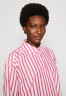 Tommy Hilfiger STRIPED ICON OVERSIZED SHIRT Button-down blouse pink/white РУБАШКА OVERSIZE STRIPED ICON Блузка на пуговицах розовый/белый
