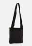 Tommy Hilfiger ESSENTIAL CROSSOVER UNISEX Across body bag black ESSENTIAL CROSSOVER UNISEX Сумка через плечо черный