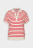 Tommy Hilfiger Polo shirt white/fireworks рубашка поло белый/фейерверк