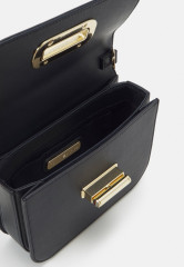 Tommy Hilfiger HERO TURNLOCK MINI CROSSOVER Across body bag space blue HERO TURNLOCK MINI CROSSOVER Сумка через плечо космический синий