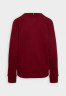 Tommy Hilfiger 1985 MINI CORP LOGO Sweatshirt rouge ЛОГОТИП MINI CORP 1985 – Свитер румяна