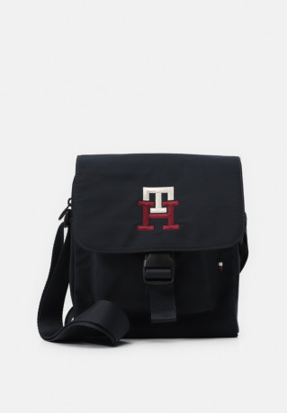 Tommy Hilfiger TWILIGHT MINI MESSENGER Across body bag space blue TWILIGHT MINI MESSENGER Сумка через плечо космический синий