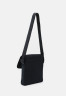 Tommy Hilfiger TWILIGHT MINI MESSENGER Across body bag space blue TWILIGHT MINI MESSENGER Сумка через плечо космический синий