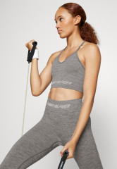 Tommy Hilfiger ESSENTIALS LOW SEAMLESS  Light support sports bra light grey  ESSENTIALS LOW SEAMLESS — Спортивный бюстгальтер с легкой поддержкой светло-серый