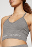 Tommy Hilfiger ESSENTIALS LOW SEAMLESS  Light support sports bra light grey  ESSENTIALS LOW SEAMLESS — Спортивный бюстгальтер с легкой поддержкой светло-серый